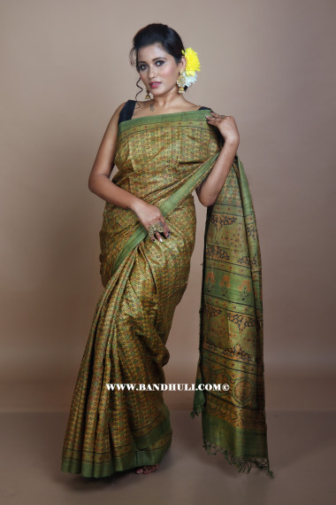 Sap Green Color Floral and Geometrical Pattern Tussar Ajrakh Hand Block Saree